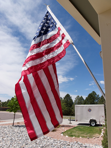 Photograph of American flag on military home at Peterson Air Force Base on Memorial Day 2013.